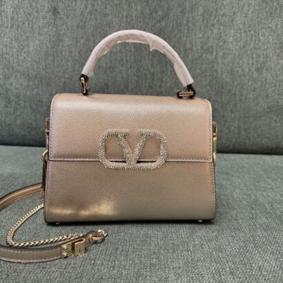 Valentin Garavani VSLING Small Rhinestone Bag.