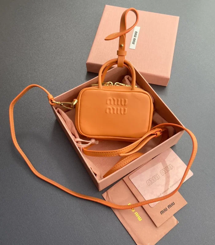 MICRO BAG KEYCHAIN 11 IN HOT CINNAMON ORANGE CALFSKIN EMBOSSED LOGO