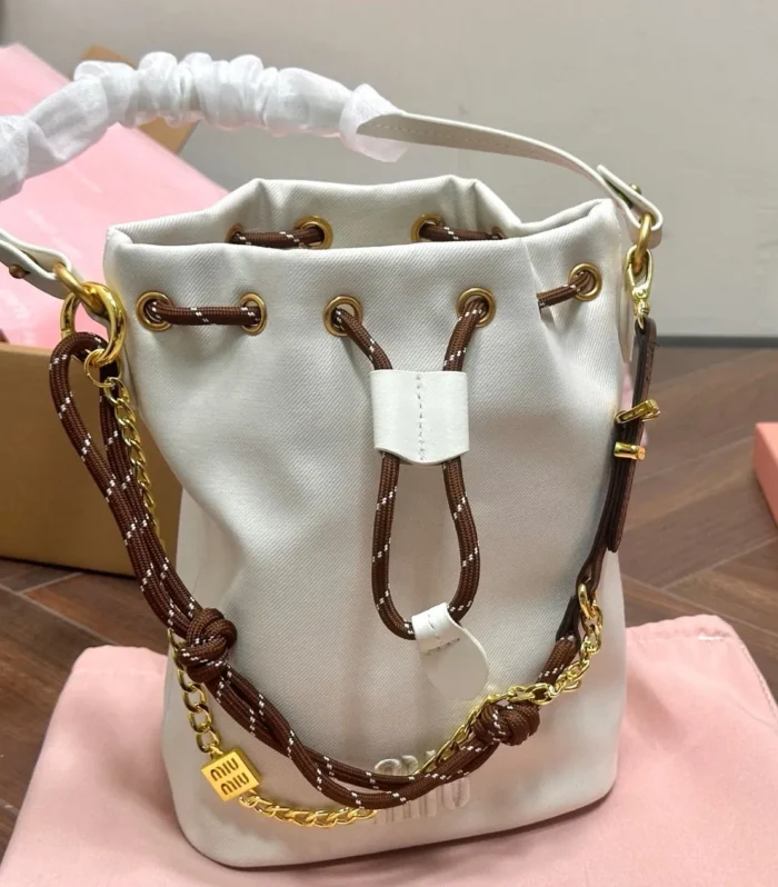 DRAWSTRING BUCKET BAG 21 IN WHITE CANVAS GOLD HARDWARE