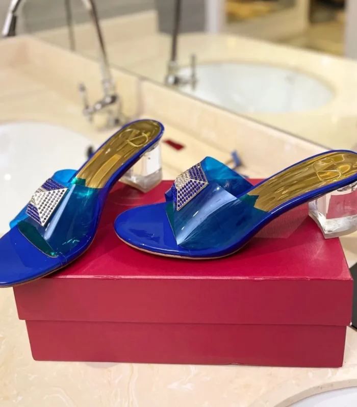 HIGH MULE 60MM IN COBALT BLUE SHEEPSKIN AND TRANSPARENT PVC