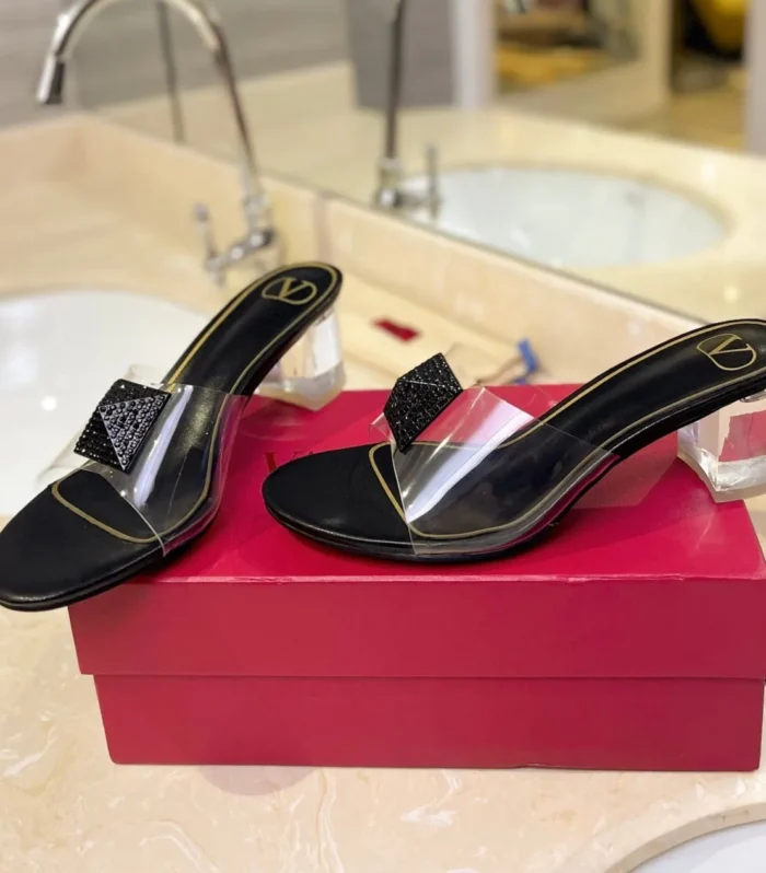 HIGH MULE 60MM IN BLACK SHEEPSKIN AND TRANSPARENT PVC