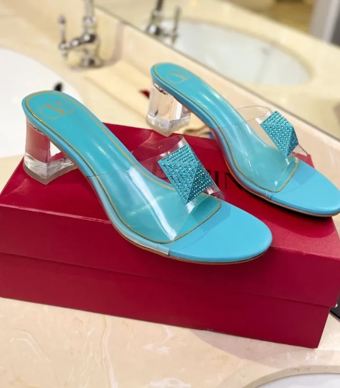 HIGH MULE 60MM IN AQUA BLUE SHEEPSKIN AND TRANSPARENT PVC