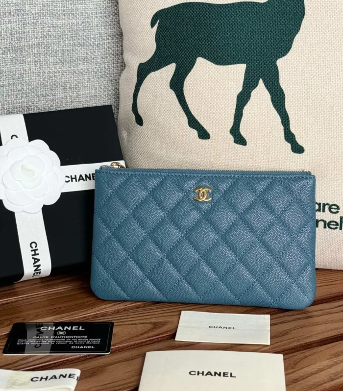 cc zipped wallet 20cm blue quilted caviar gold hardware