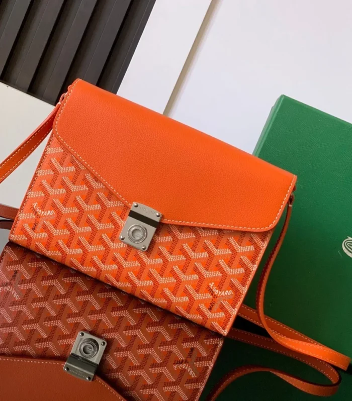 CHYPRE WALLET-POUCH 21 IN ORANGE GOYARDINE CANVAS AND CALFSKIN