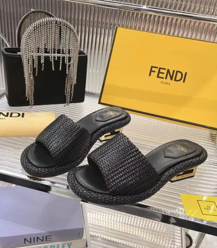FENDI BAGUETTE SLIDES WOMEN IN BLACK RAFFIA