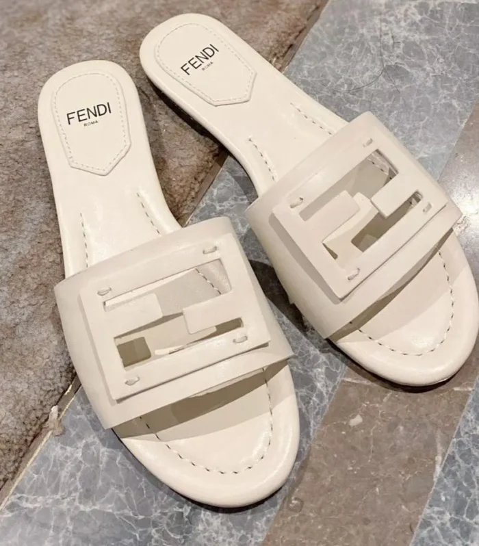 FENDI BAGUETTE SLIDES IN WHITE LAMBSKIN