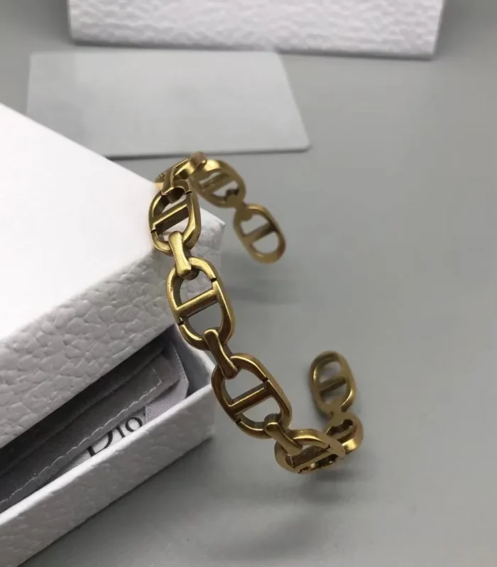 CD MOTIF GOLD CUFF BRACELET