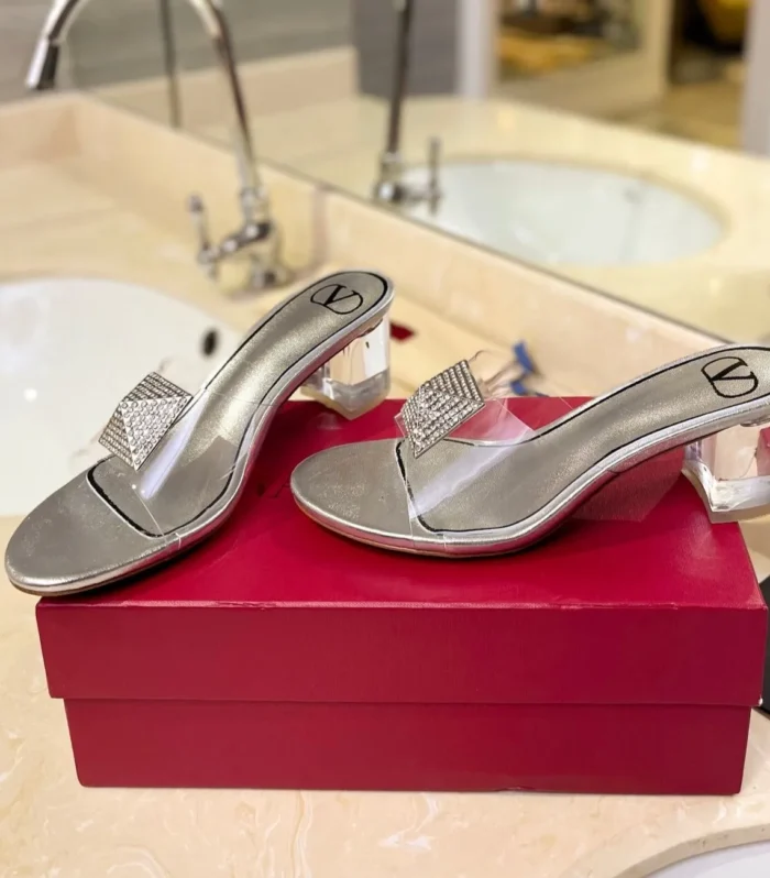 HIGH MULE 60MM IN SILVER SHEEPSKIN AND TRANSPARENT PVC