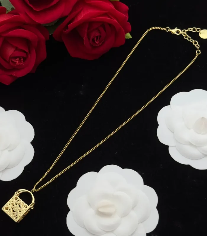 ANAGRAM BAG GOLD NECKLACE